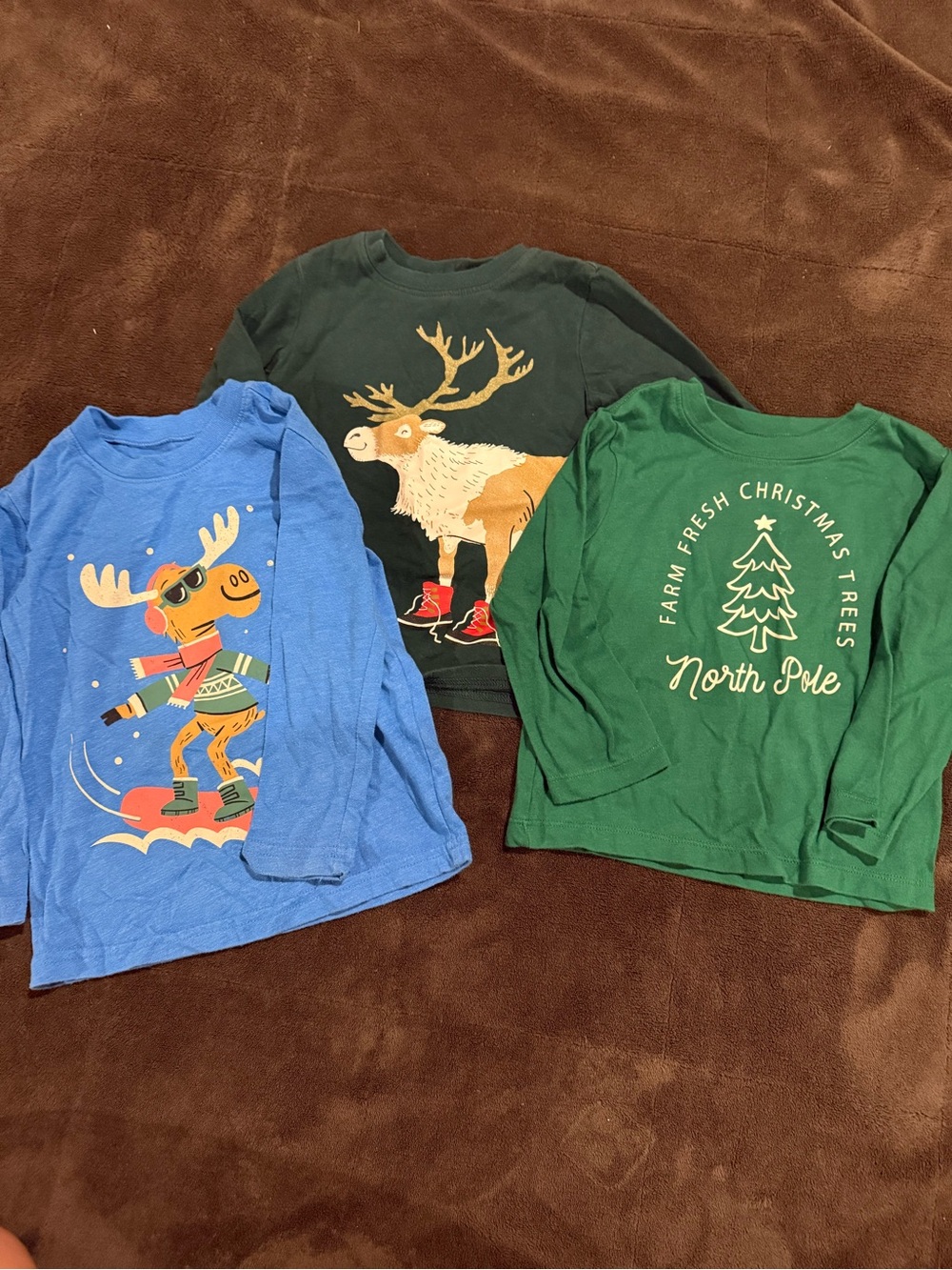 Three Carter’s Kids Long-Sleeve Holiday Graphic Tees